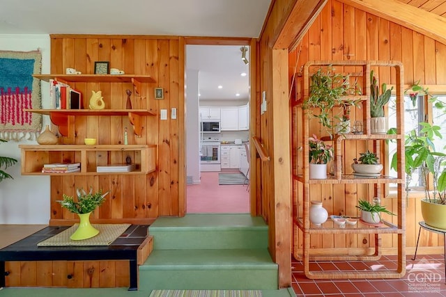 interior space featuring wood walls