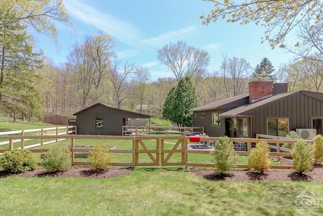 view of yard featuring a gate, ac unit, and fence