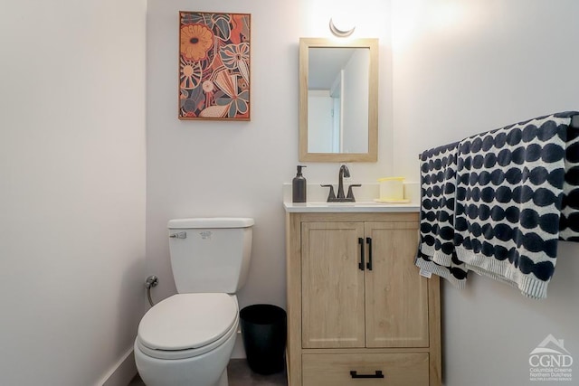 half bath with toilet and vanity