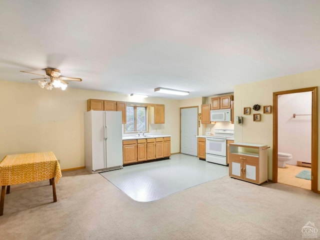 kitchen with ceiling fan, light colored carpet, white appliances, and baseboard heating