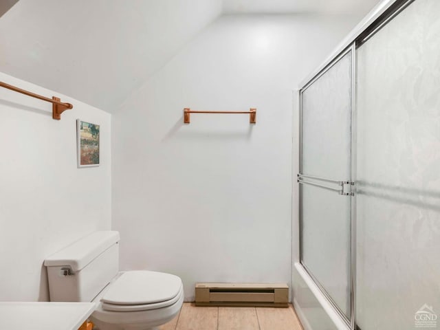 bathroom featuring a baseboard heating unit, combined bath / shower with glass door, vaulted ceiling, tile patterned flooring, and toilet