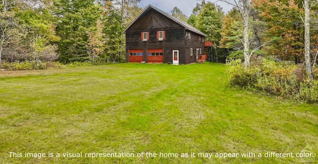 view of yard featuring a garage