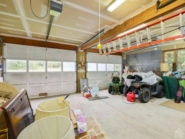 garage featuring a garage door opener