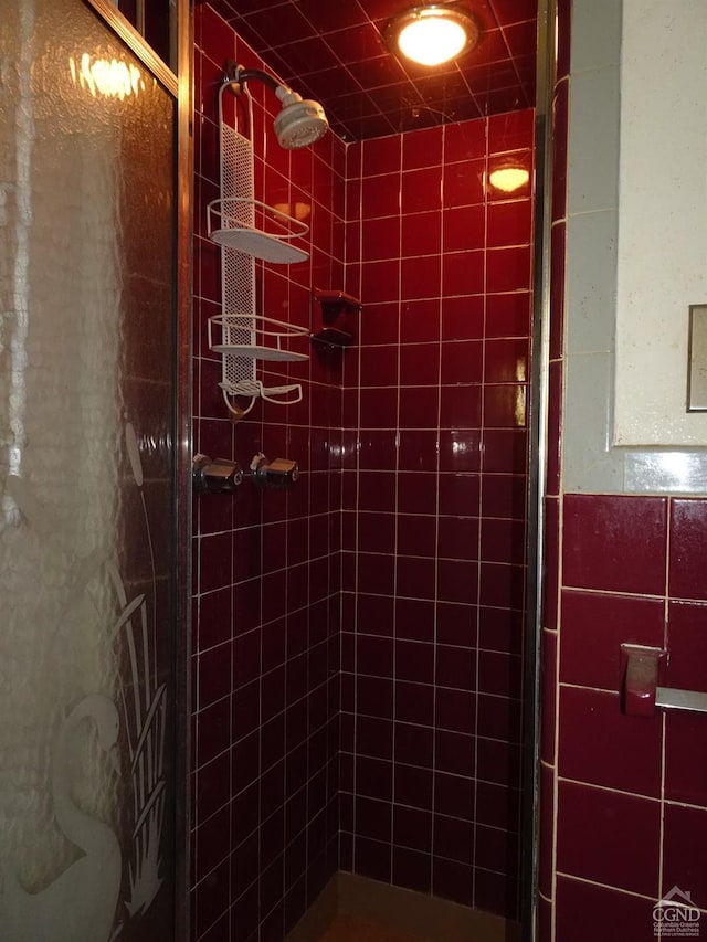 full bath featuring a shower stall