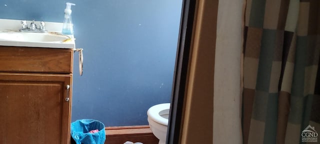 bathroom with vanity and toilet