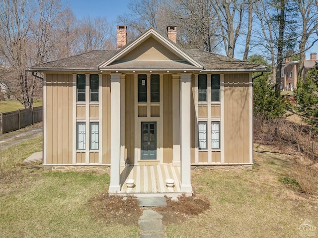 view of outdoor structure featuring fence