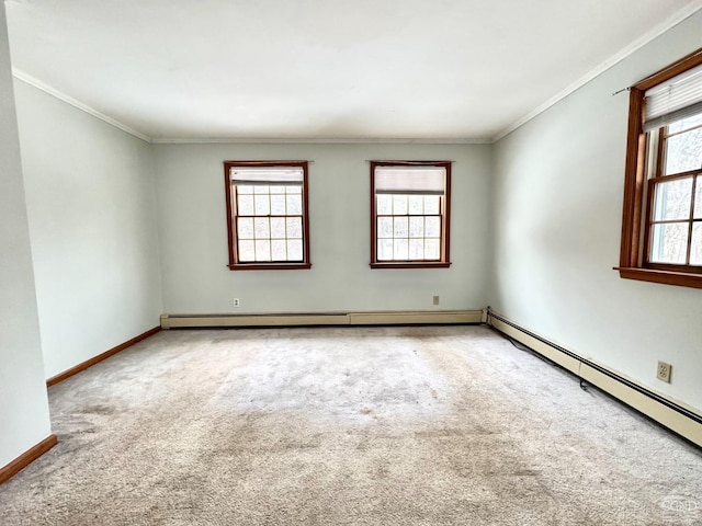 unfurnished room featuring carpet floors, baseboard heating, and crown molding