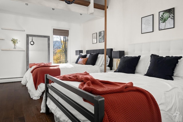 bedroom with wood-type flooring, baseboard heating, and beam ceiling