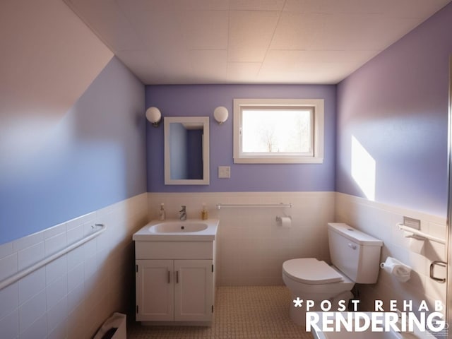 bathroom with tile patterned flooring, vanity, toilet, and tile walls