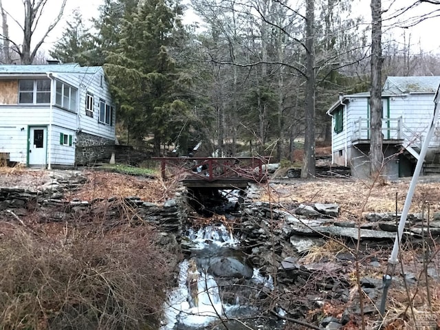 view of yard with a sunroom