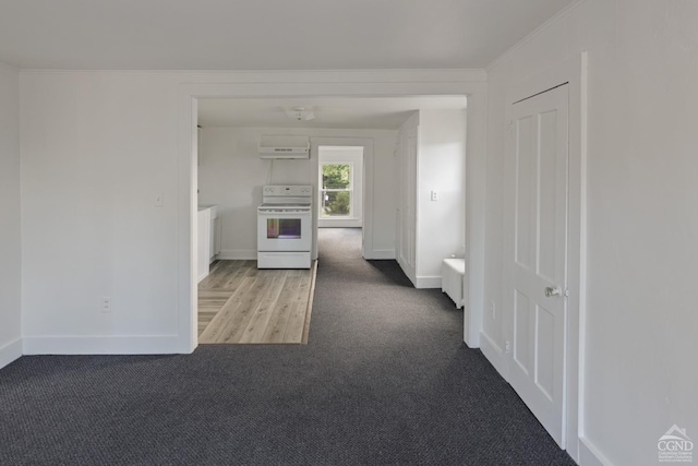 hall with light hardwood / wood-style floors and ornamental molding