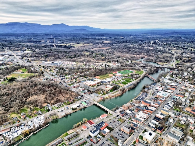 bird's eye view with a water and mountain view