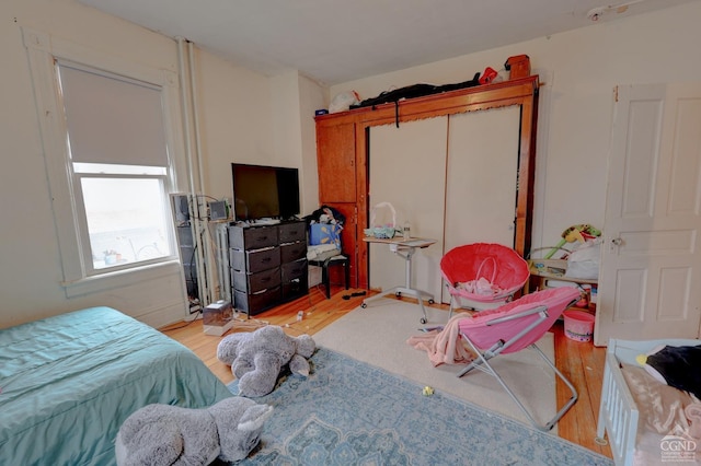 bedroom featuring light hardwood / wood-style flooring