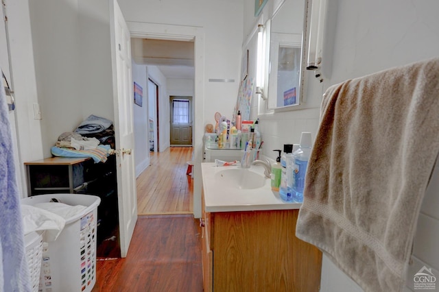 bathroom featuring vanity and hardwood / wood-style flooring