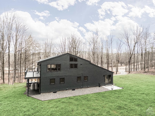 back of property featuring a wooden deck, a yard, and cooling unit