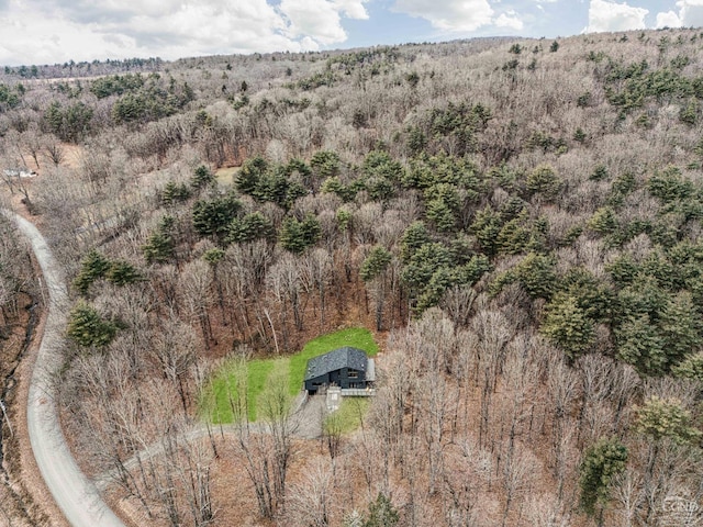bird's eye view featuring a view of trees
