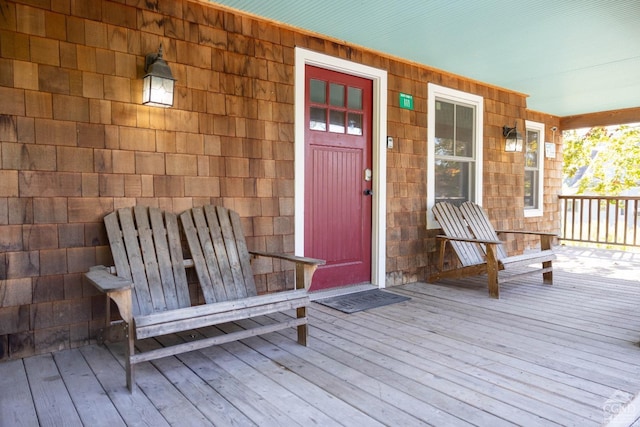 property entrance featuring covered porch