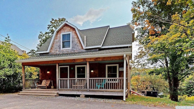 farmhouse inspired home with covered porch