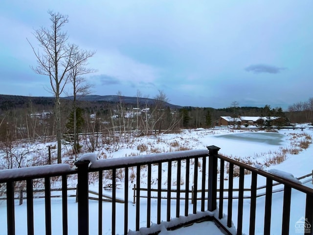 view of snow covered deck