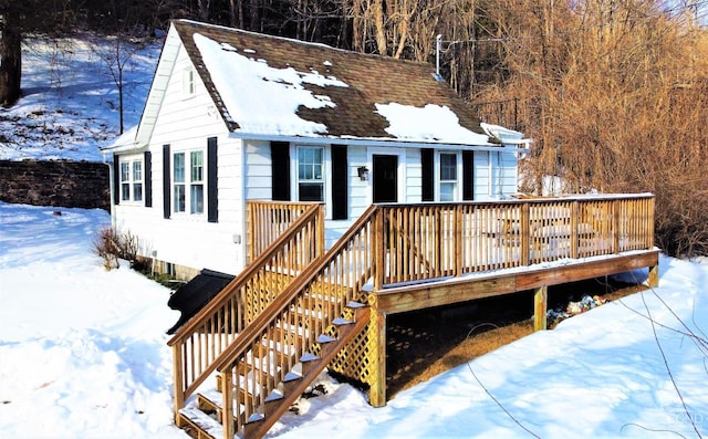 view of front of property featuring a deck