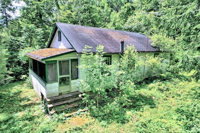 exterior space with a sunroom