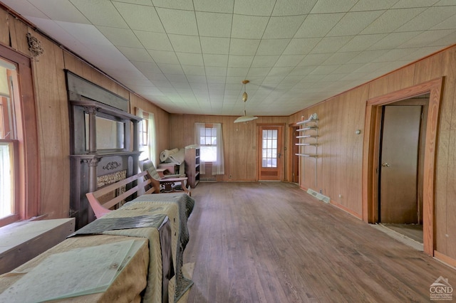 dining space with hardwood / wood-style floors