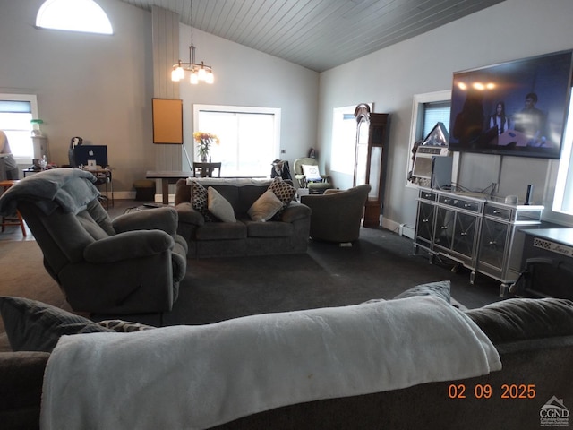 carpeted living room featuring lofted ceiling, wooden ceiling, and a chandelier