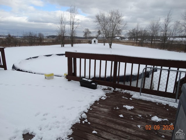 view of snow covered deck