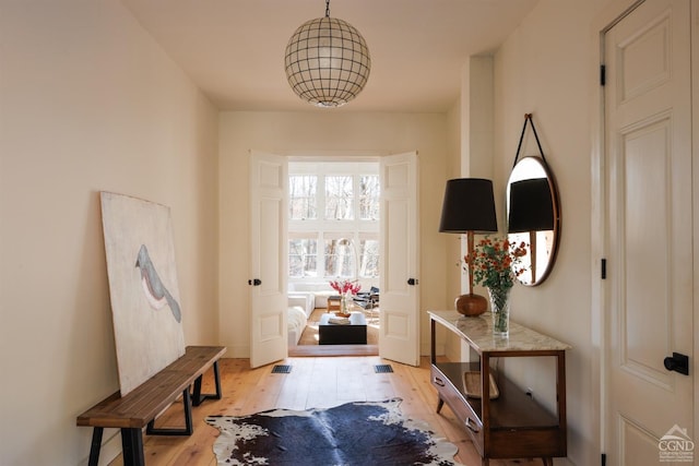 doorway to outside featuring light hardwood / wood-style floors