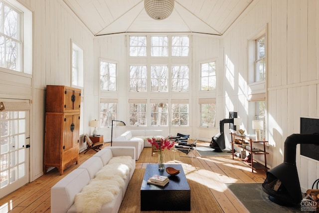 sunroom with vaulted ceiling