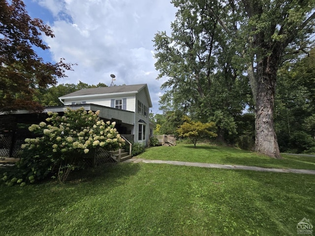 view of yard featuring a deck