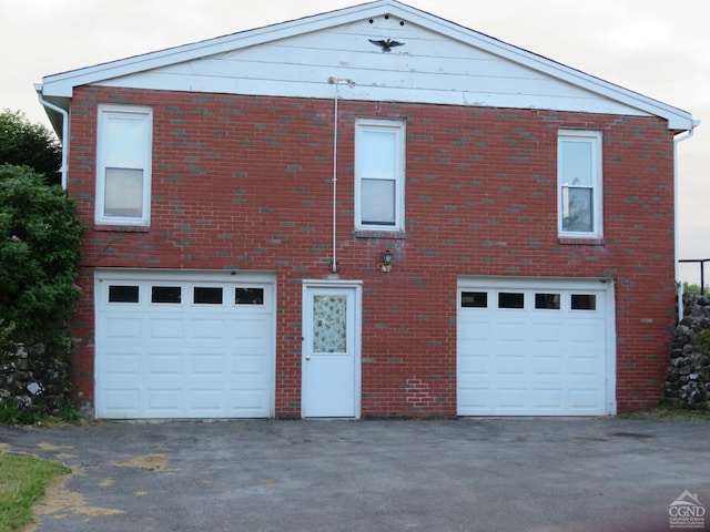 exterior space with a garage