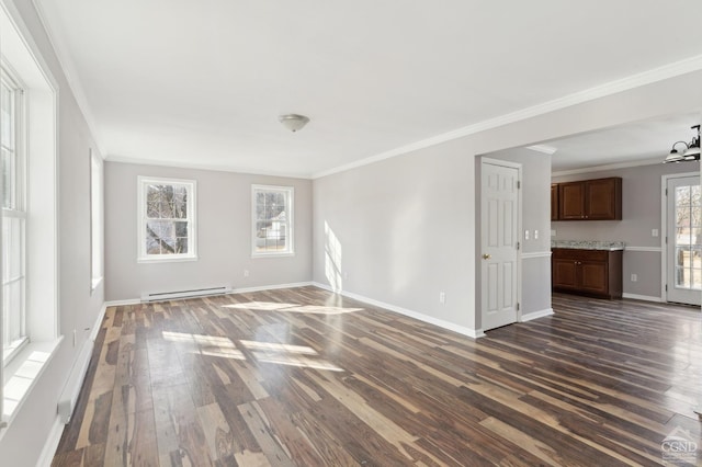 unfurnished room featuring a baseboard heating unit, crown molding, dark wood-style floors, and baseboards