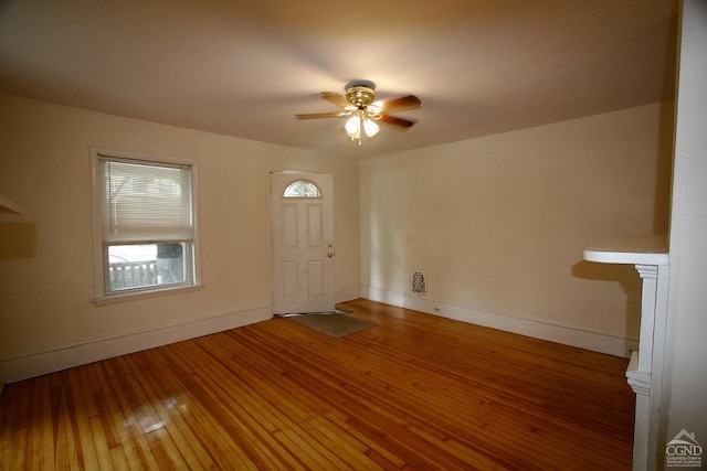 entryway featuring ceiling fan and wood-type flooring