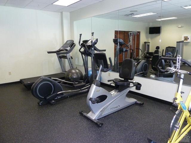 gym with a drop ceiling