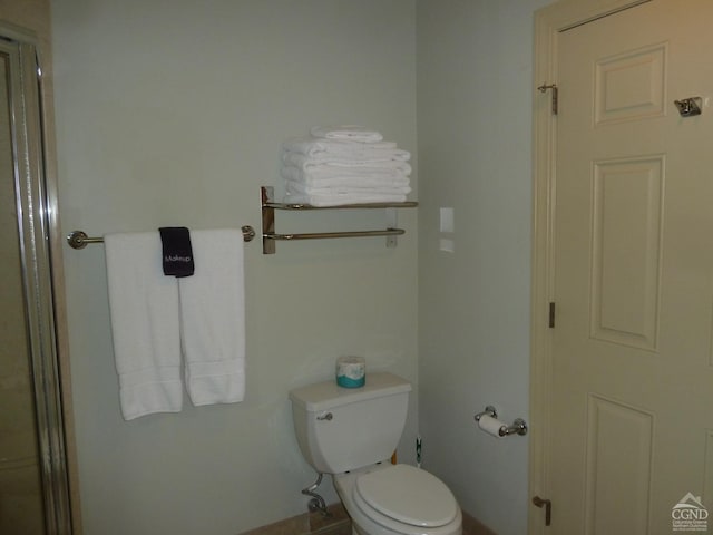 bathroom featuring toilet