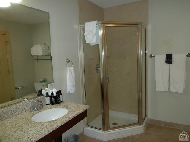 bathroom featuring tile patterned floors, sink, and walk in shower