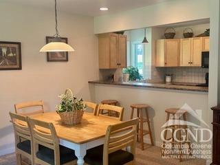 dining space featuring hardwood / wood-style flooring