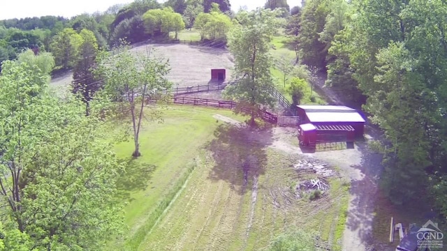 birds eye view of property featuring a rural view