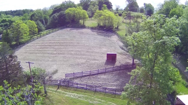 birds eye view of property featuring a rural view