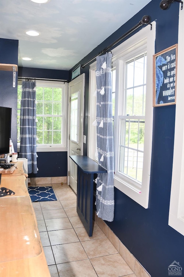 interior space featuring light tile patterned floors