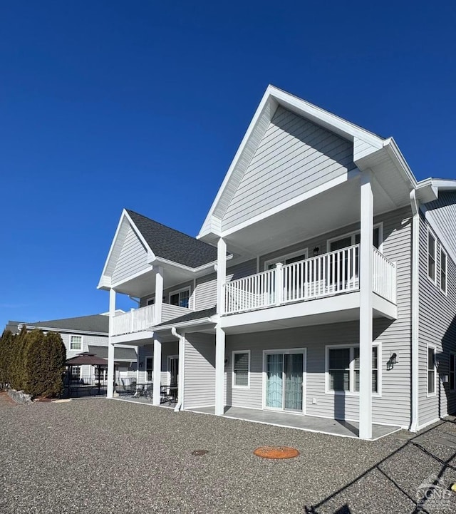 view of front of property with a balcony