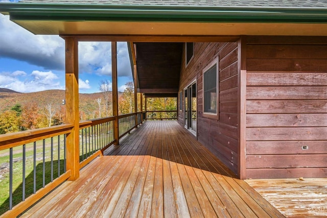 wooden terrace with a mountain view