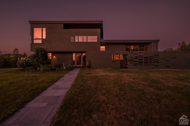 contemporary house featuring a yard