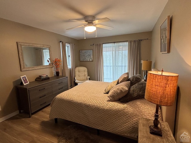 bedroom featuring ceiling fan and wood finished floors