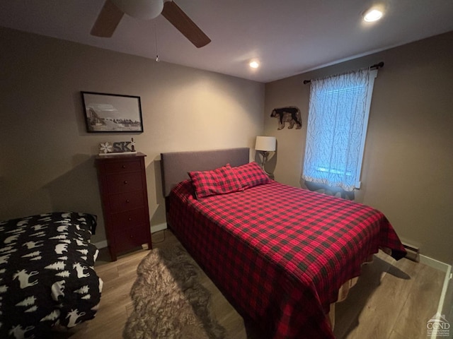 bedroom featuring light wood-style floors, ceiling fan, baseboards, and recessed lighting