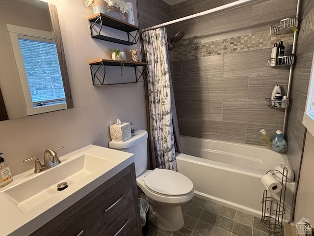 full bathroom featuring shower / tub combo, vanity, and toilet