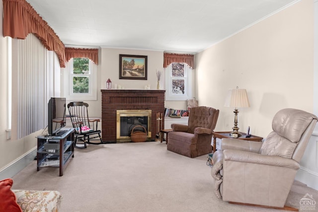 living room with ornamental molding, a fireplace, and carpet flooring