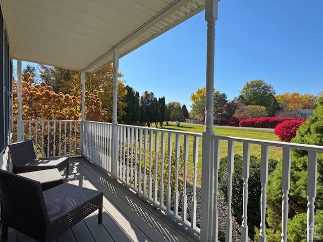 balcony featuring covered porch