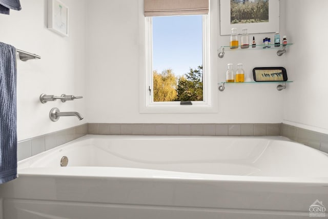 bathroom with a washtub